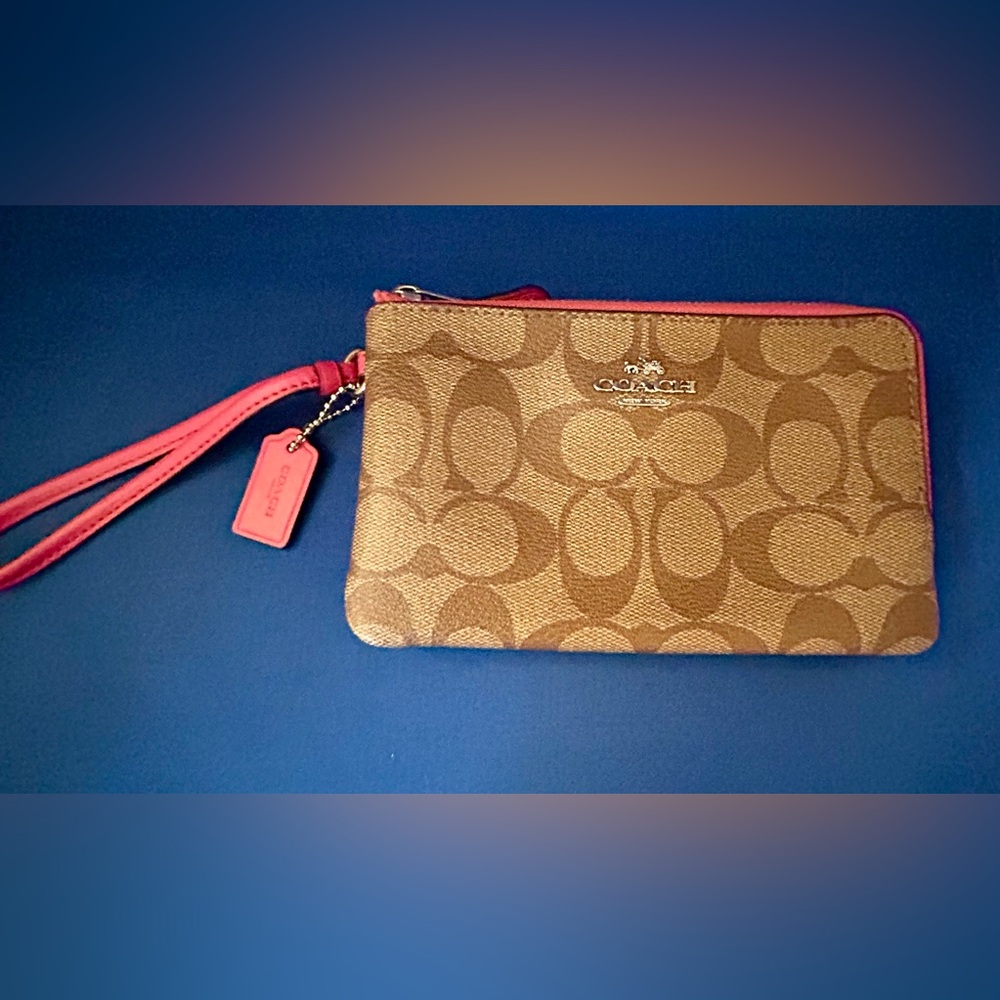 Coach Tan Signature Canvas Magenta Pink Trim, double Zip Top
Wristlet